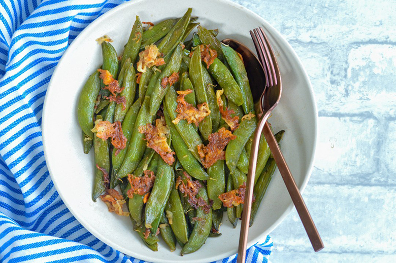 Parmesan Roasted Snap Peas in a bowl