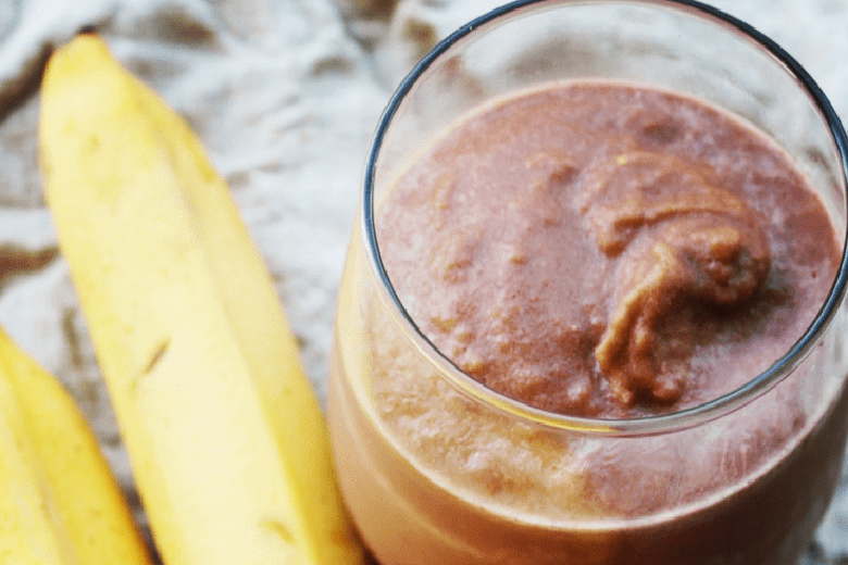 Vegan Chocolate Banana Shake in glass with banana