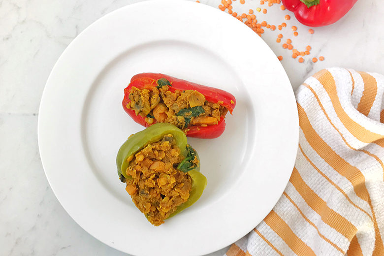 Curried Lentil Stuffed Peppers on a white plate