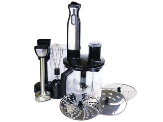 A food processor and its implements on a white background