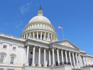 Washington DC, United States landmark. National Capitol building with US flag.